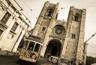 Tram 28 passing Lisbon Cathedral